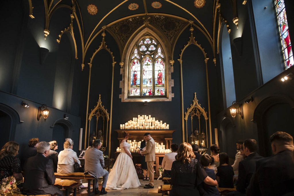 Bride and groom see each other for the first time on their wedding day in the chapel at Lartington Hall.