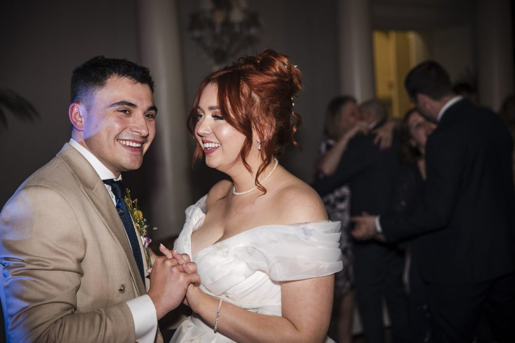 Bride and groom on the dance floor at their wedding at Lartington Hall.