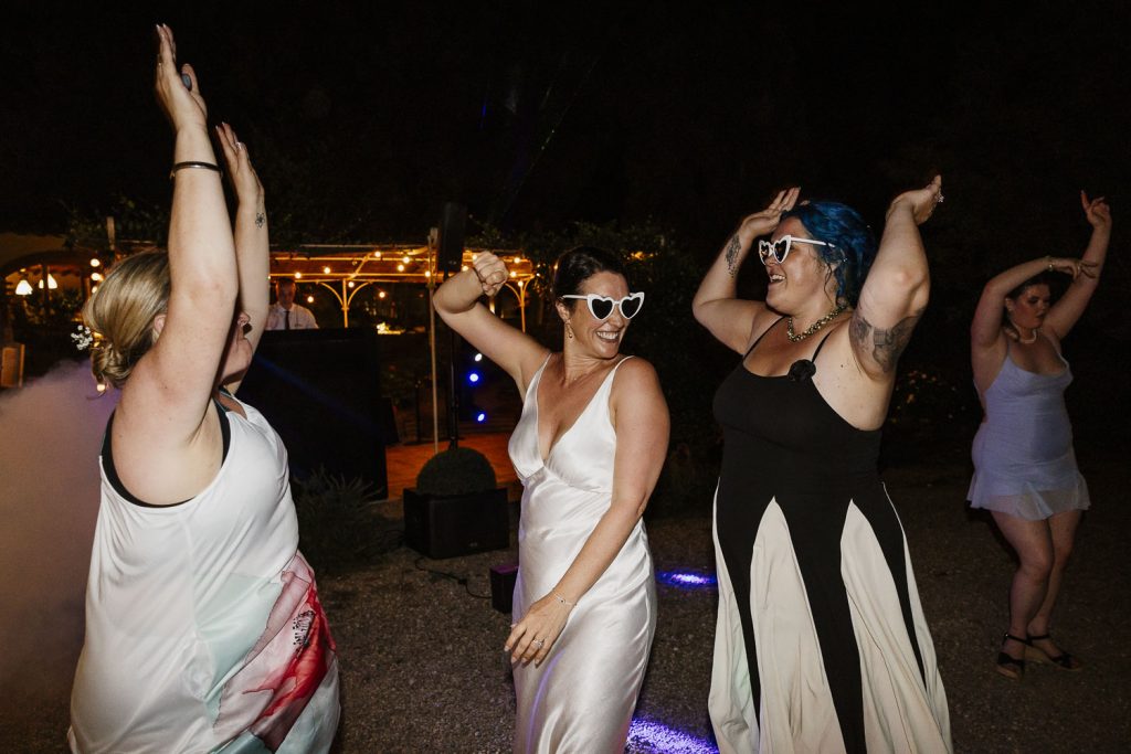 Bride dancing on the dance floor on her wedding day in Tuscany.