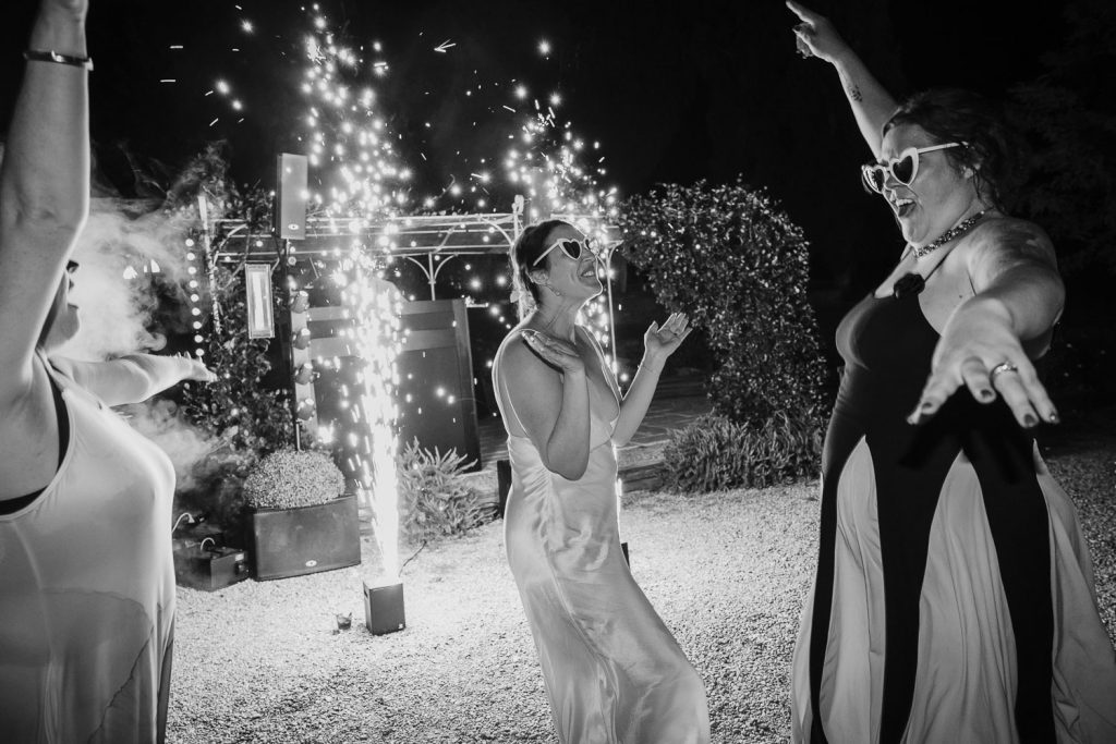 Bride with indoor sparklers on her wedding day.