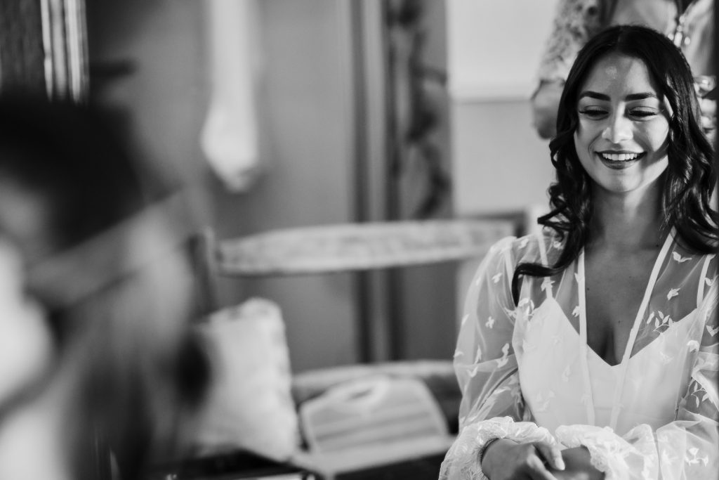 Bride getting ready for her wedding at Villa San Crispolto.