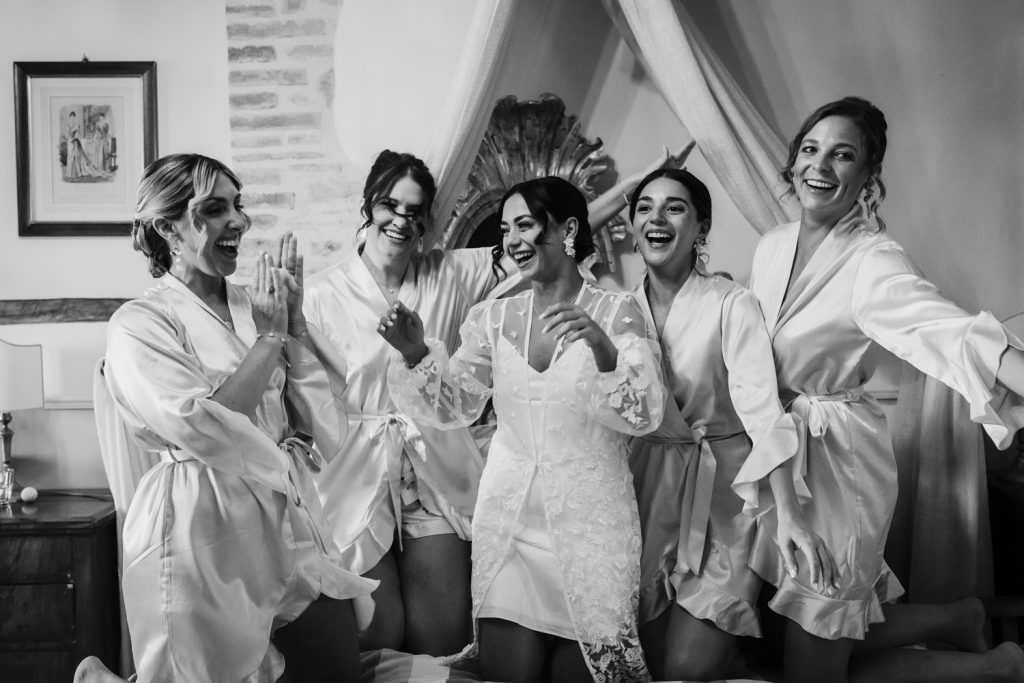 Bride with her bridesmaids getting ready at Villa San Crispolto.